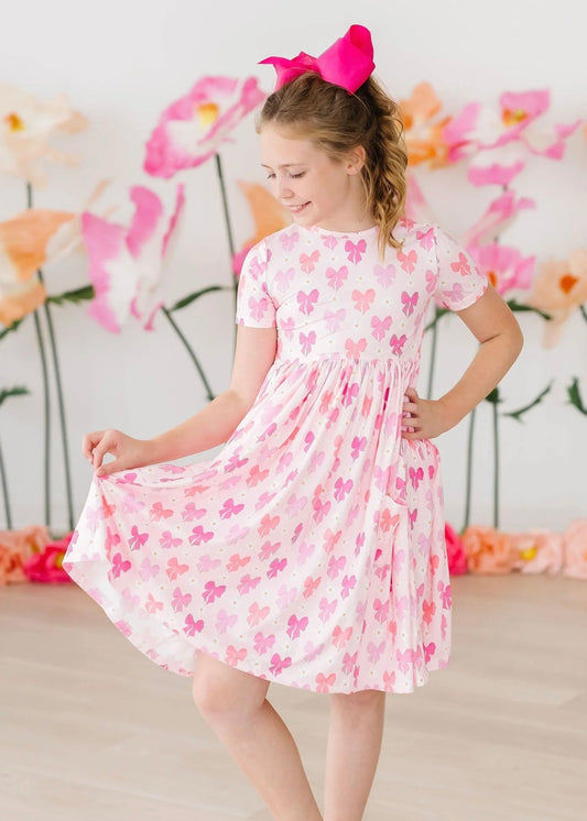 “Mila & Rose” Bows Pocket Twirl Dress